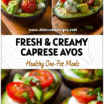 Halved avocados stuffed with Caprese salad toppings served as a fresh summer lunch dish.